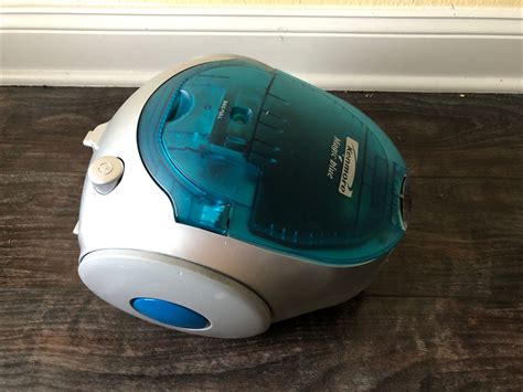 Comparing the Kenmore Magic Blue to Traditional Upright Vacuum Cleaners